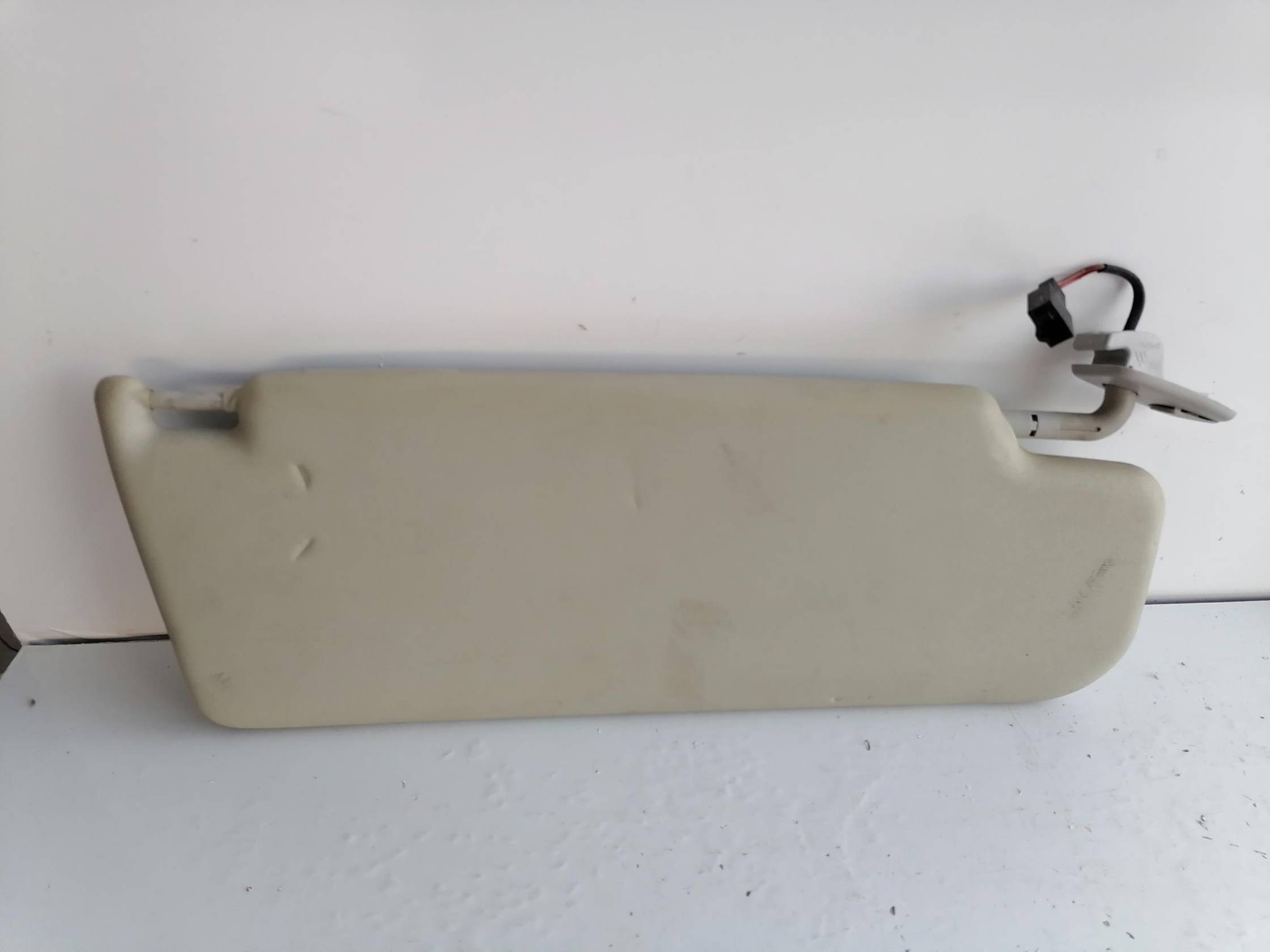 Aletta parasole parabrezza sx.